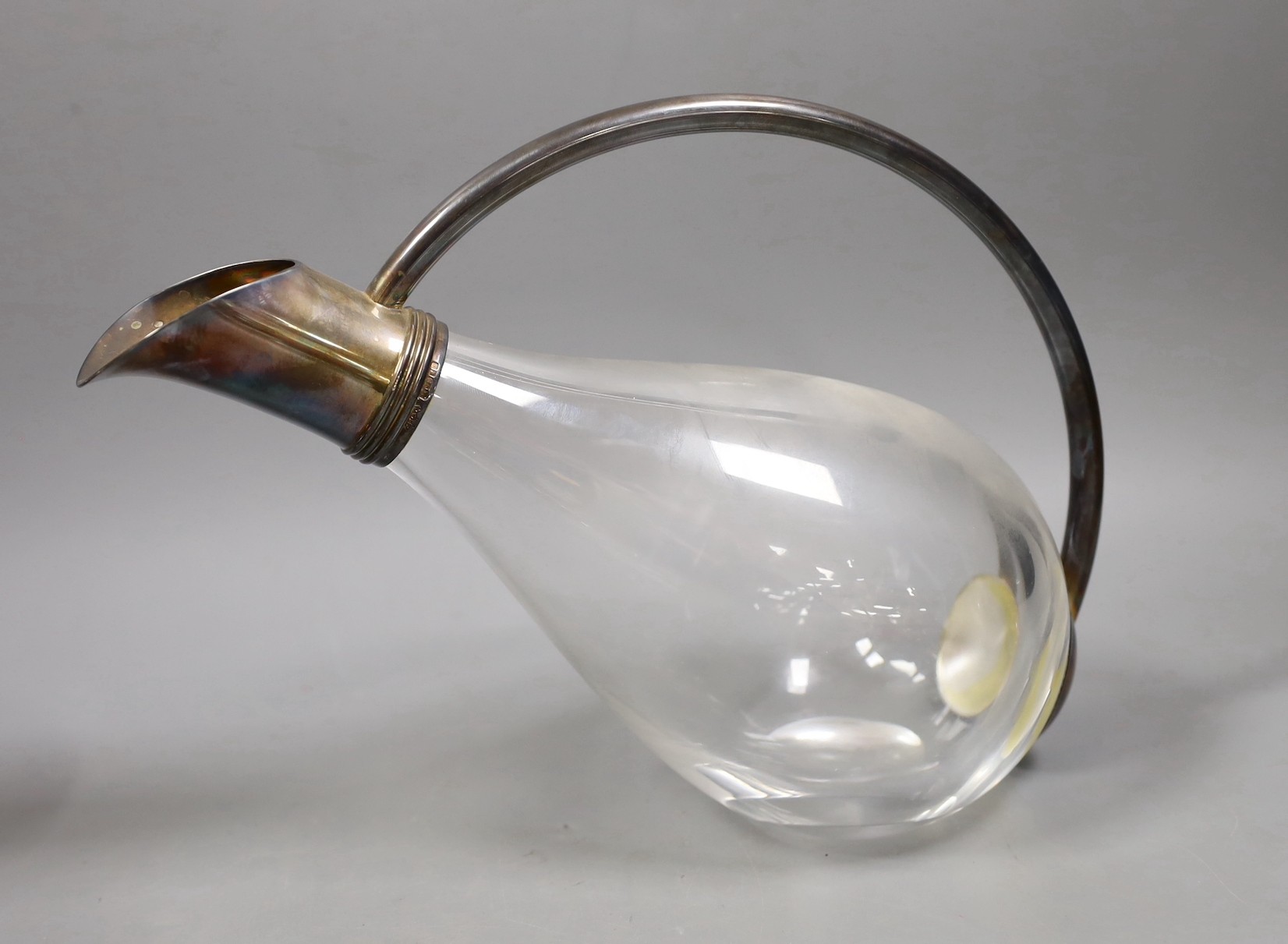 A set of eight sterling dessert coupes with glass inserts, height 6mm, together with a modern silver mounted decanter, by Asprey & Co Ltd (lacking stopper - one glass insert missing)